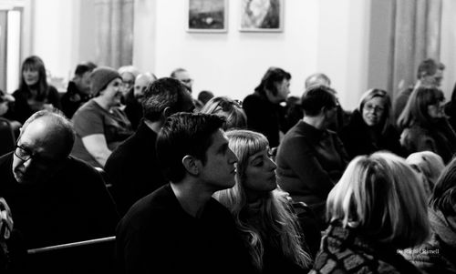Image of people at a concert, in black and white